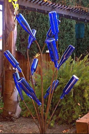 Preserved Cedar & Blue Bottle Tree  Bottle garden, Bottle tree, Diy garden  decor