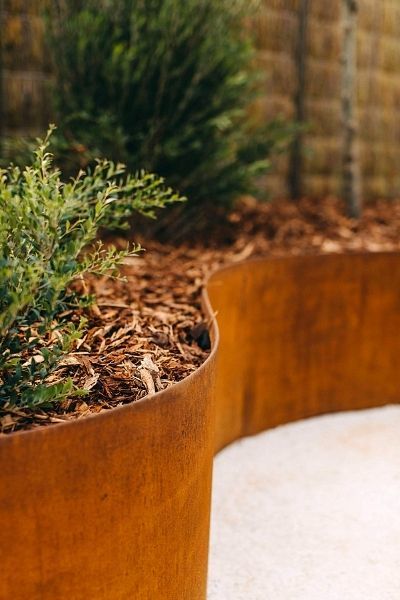 Garden bed border edging made from corten steel