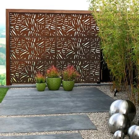 An outdoor screen made from corten steel