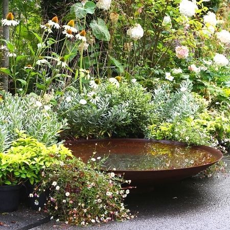 A water bowl made of corten steel