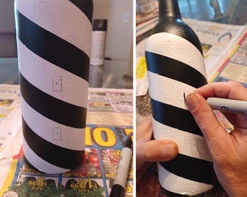 Detailing lines and windows on the wine bottle lighthouse