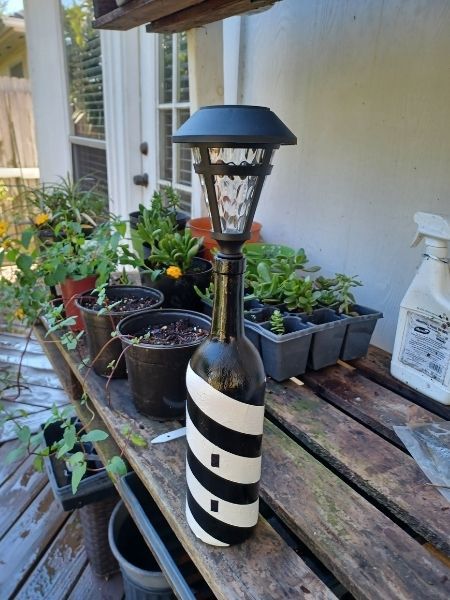 Completed wine bottle lighthouse