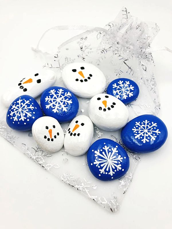 Snowflakes and Snowmen painted rocks